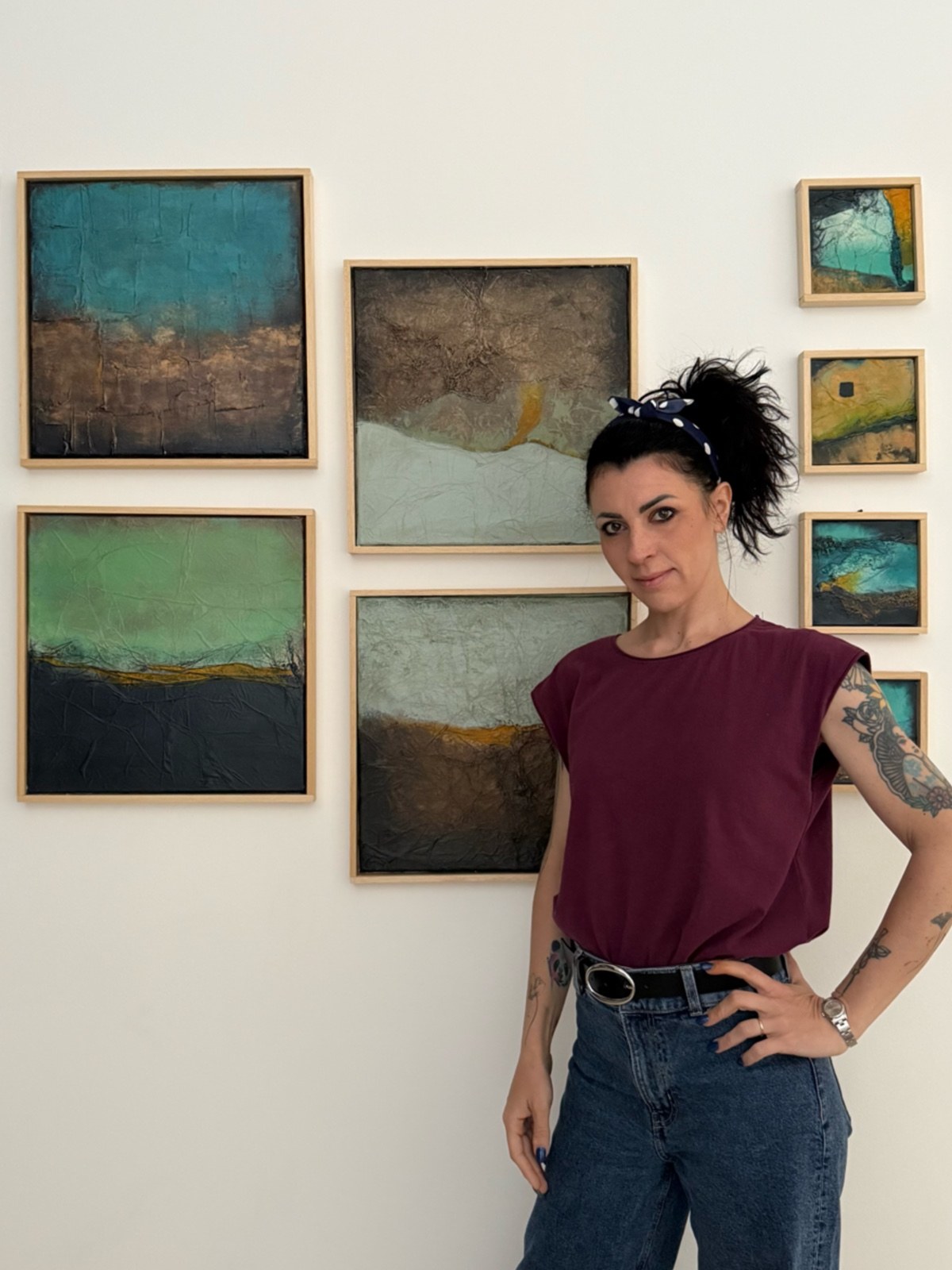 Barbara Corbucci with her paintings